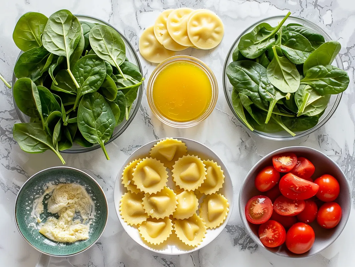 Fresh ingredients for making ravioli soup including olive oil, onions, garlic, tomatoes, broth, ravioli, and spinach