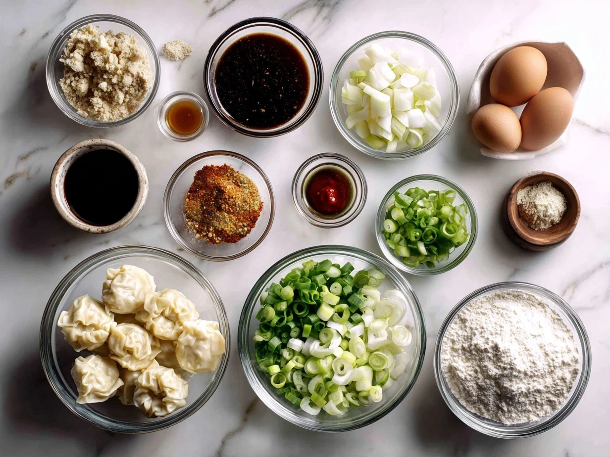 All the ingredients needed to create Potsticker Soup including potstickers, bok choy, mushrooms, and broth.